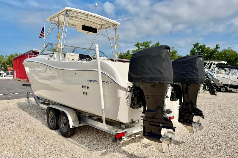 Slide: The Image of 2007 World Cat 250 DC boat on trailer with dual outboard motors. - 7