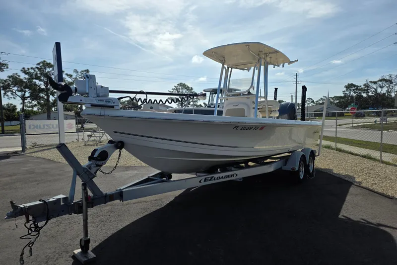 Slide: The Image of 2023 Bulls Bay 2400 boat on trailer in outdoor setting. - 2