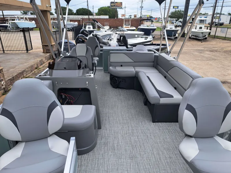 Slide: The Image of Interior of 2026 Avalon Venture Quad Fish with gray seating. - 9