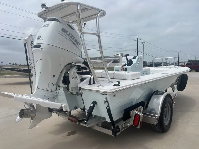 Slide: The Image of 2024 Beavertail Strike 17 boat with Suzuki engine on trailer. - 8