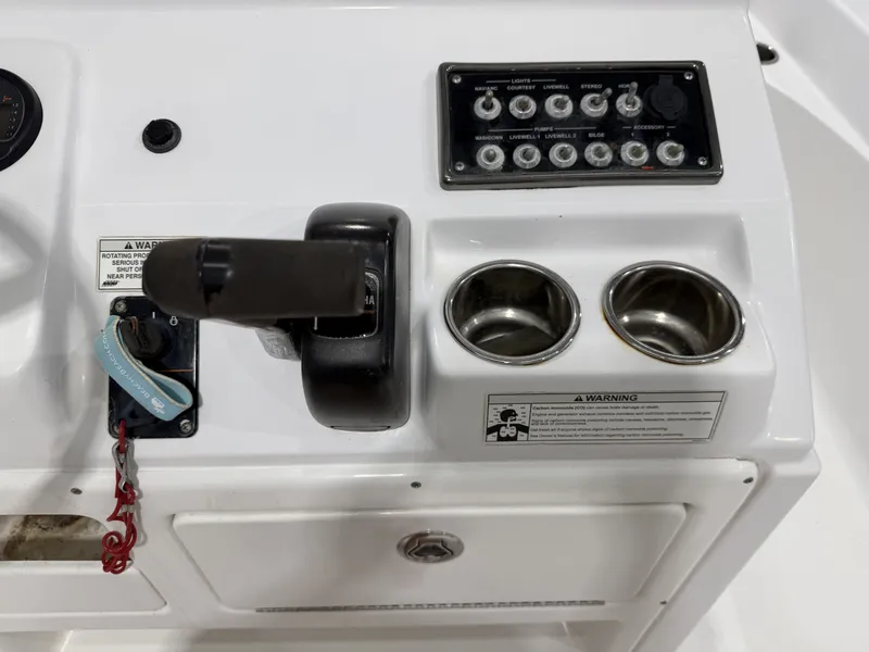 Slide: The Image of Control console of a 2015 Sportsman Masters 227 Bay Boat. - 22