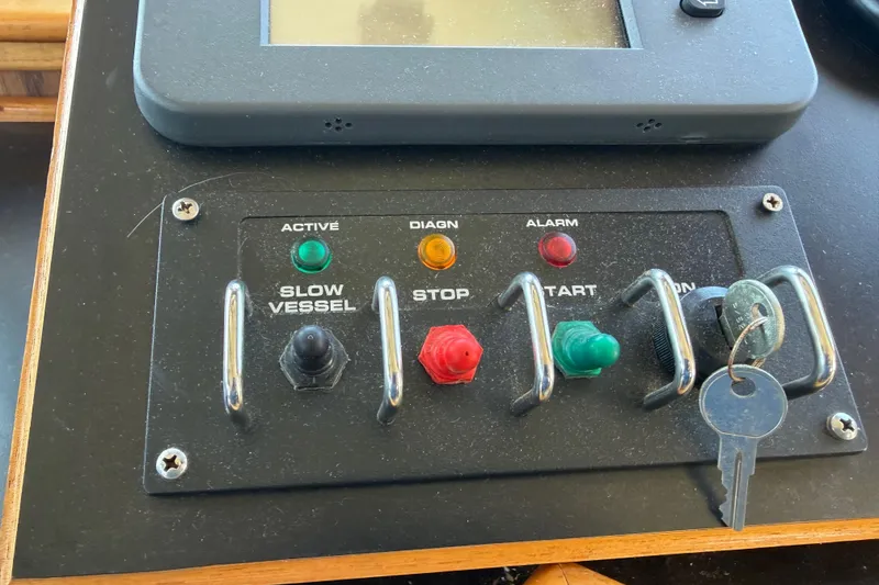 Slide: The Image of Control panel of a 1954 American 70 Tug with switches and keys. - 48