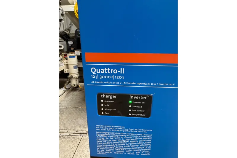 Slide: The Image of Blue Quattro-II inverter panel on a 1954 American 70 Tug boat. - 71