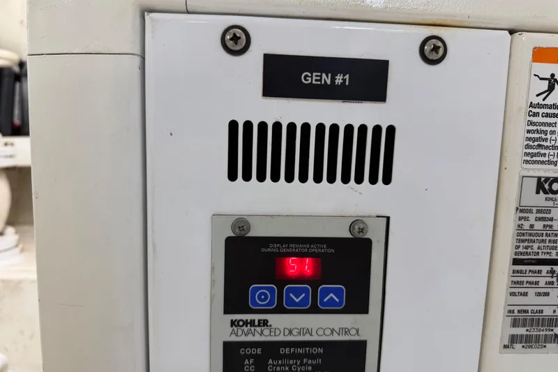 Slide: The Image of Control panel of a Kohler generator, displaying "51" with advanced digital controls. - 73