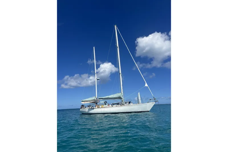 The Image of Sailing yacht SKYE 51 from 1981 on clear blue ocean under bright sky. - 0