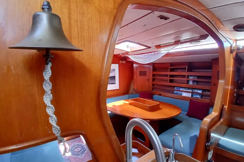 Slide: The Image of Interior of 1981 SKYE 51 yacht with wooden furnishings and nautical decor. - 31