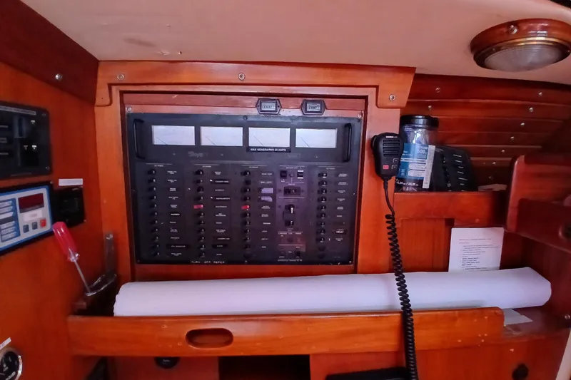 Slide: The Image of Control panel of a 1981 SKYE 51 yacht with navigation and communication equipment. - 54