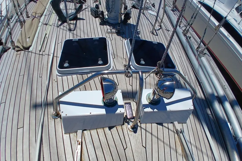 Slide: The Image of Deck of 1981 Kaufman Skye 51 sailboat with hatches and metal fittings. - 69