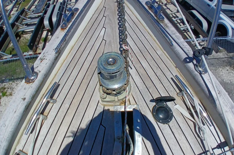 Slide: The Image of Deck of 1981 Kaufman Skye 51 sailboat with winch and chain. - 71