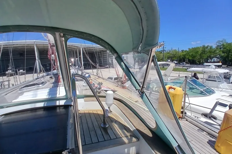 Slide: The Image of Cockpit view of 1981 Kaufman Skye 51 sailboat docked at marina. - 72