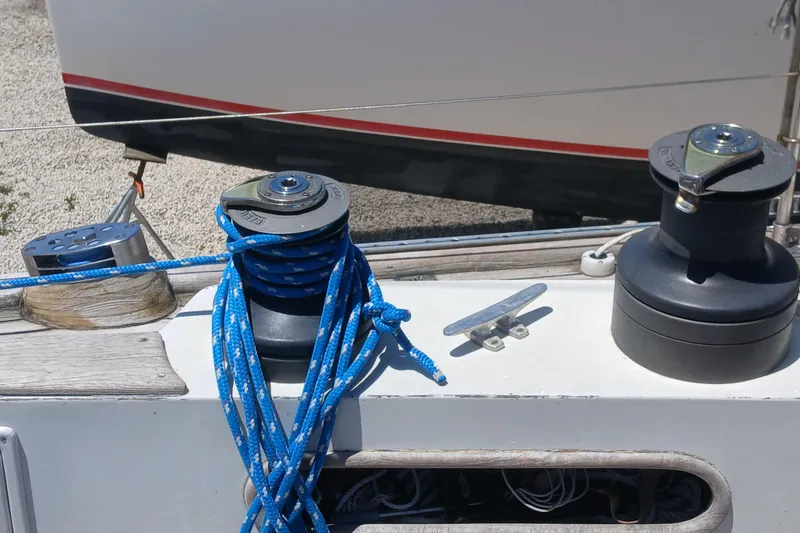 Slide: The Image of Deck of 1981 Kaufman Skye 51 sailboat with winches and blue rope. - 75