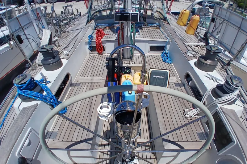Slide: The Image of Cockpit view of 1981 Kaufman Skye 51 sailboat with nautical equipment and ropes. - 83