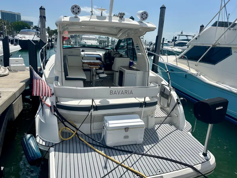 Slide: The Image of 2016 Bavaria Sport 360 HT yacht docked at marina, rear view. - 24