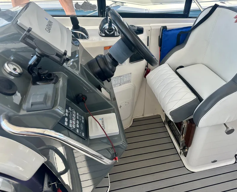 Slide: The Image of Interior helm of 2016 Bavaria Sport 360 HT with Garmin navigation system. - 28