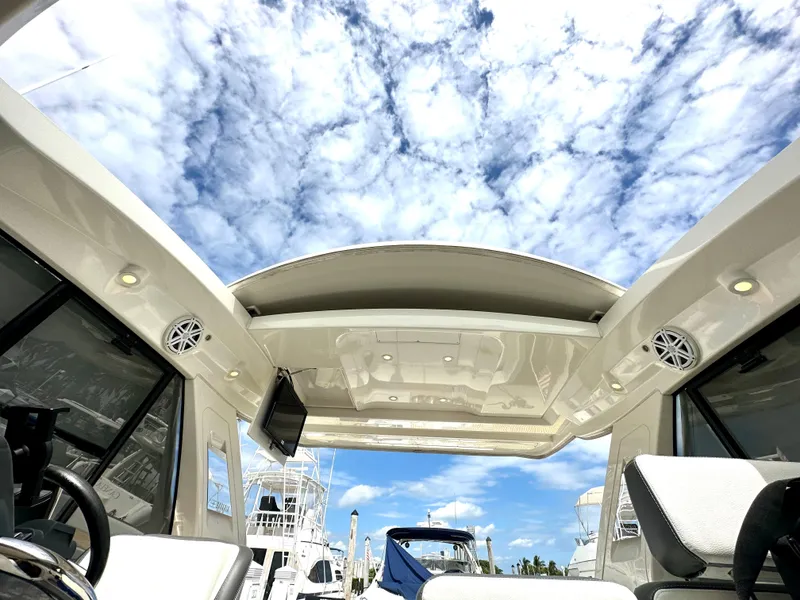 Slide: The Image of Interior view of 2016 Bavaria Sport 360 HT yacht under a partly cloudy sky. - 46