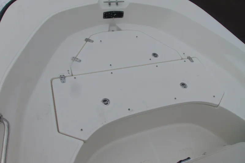 Slide: The Image of 2026 Boston Whaler 170 Montauk boat deck with storage compartments. - 10