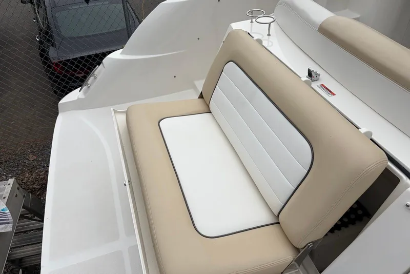 Slide: The Image of 2008 Sea Ray Sundancer 310 boat seating area with beige and white upholstery. - 14