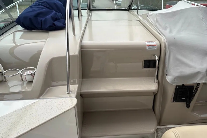 Slide: The Image of Steps leading to the deck of a 2008 Sea Ray Sundancer 310 boat. - 17