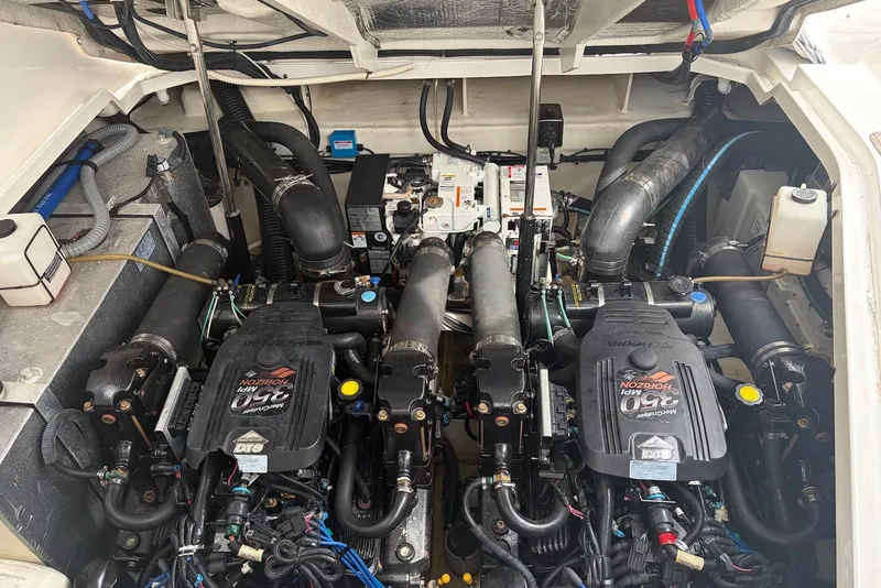 Slide: The Image of Engine compartment of a 2008 Sea Ray Sundancer 310 with twin MerCruiser engines. - 35