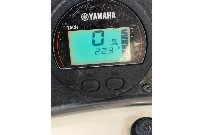 Slide: The Image of Yamaha tachometer displaying 223 hours on a 2015 Scout 177 Sport boat. - 20