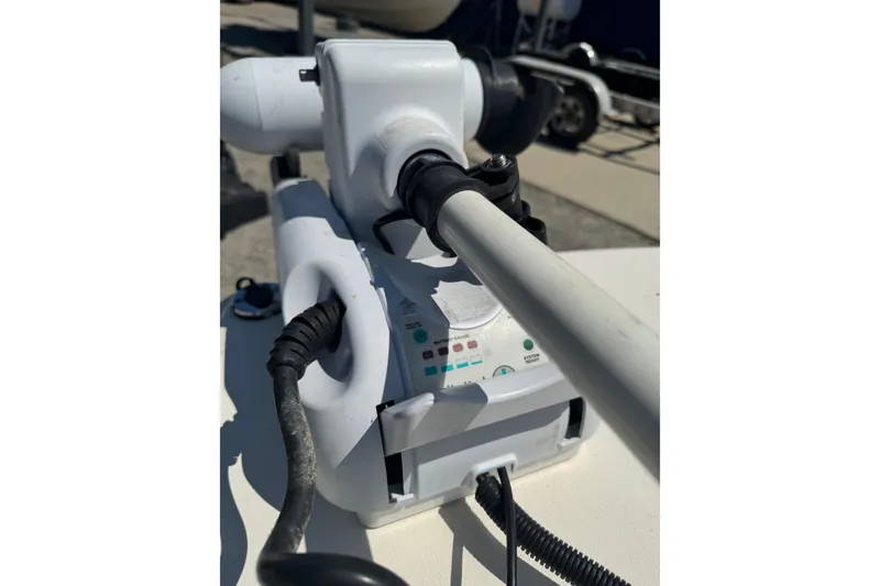 Slide: The Image of Close-up of a 2015 Scout 177 Sport boat's control panel with cables and equipment. - 3