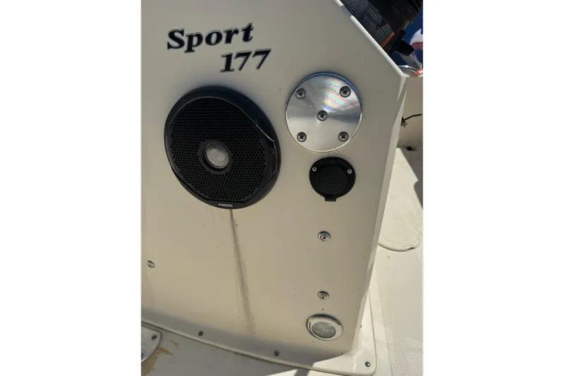 Slide: The Image of 2015 Scout 177 Sport boat console with speaker and controls. - 9