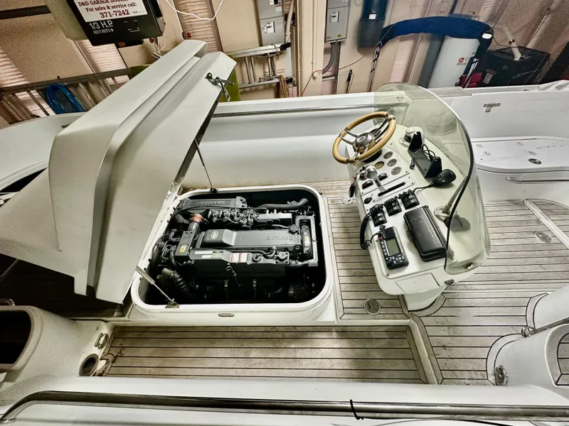 Slide: The Image of 2008 Castoldi Jet Tender 23 engine compartment and control console. - 7