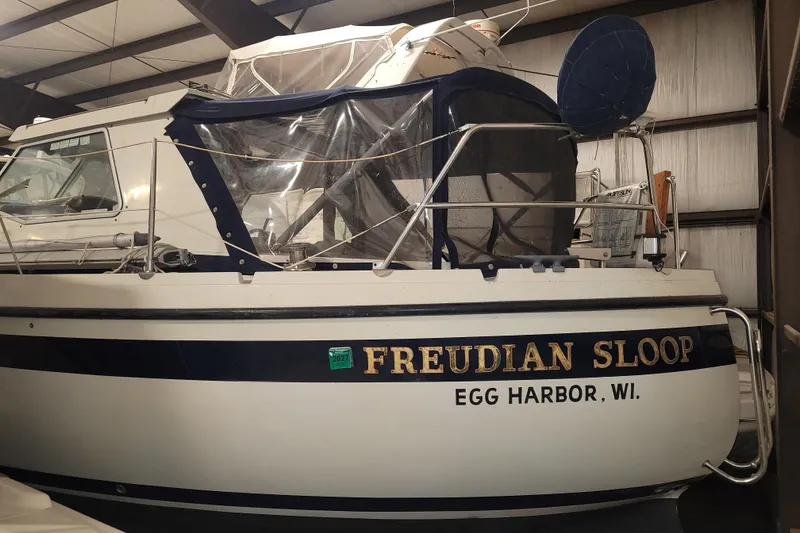 Slide: The Image of 1986 LM 32 sailboat named "Freudian Sloop" docked in Egg Harbor, Wisconsin. - 8