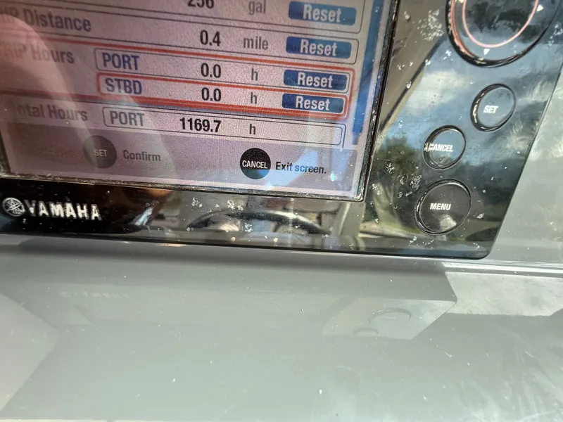 Slide: The Image of Yamaha display on Pursuit 315 OS boat, showing engine hours. - 10