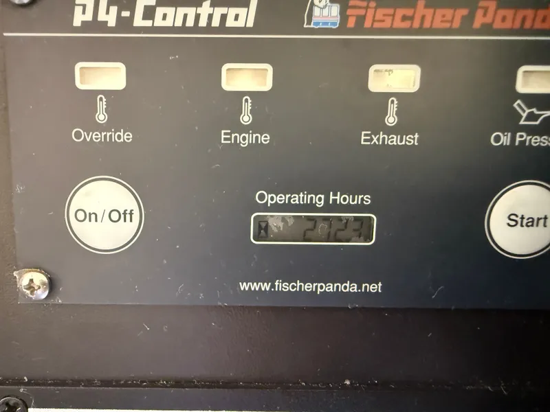 Slide: The Image of Fischer Panda control panel displaying operating hours on 2011 Pursuit 315 OS. - 75