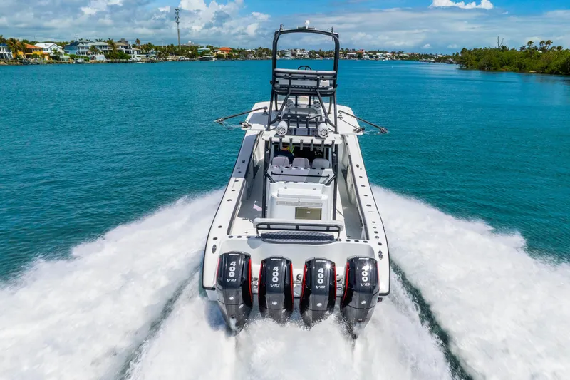 Slide: The Image of 2019 Yellowfin 42 Offshore boat cruising with four powerful engines on a sunny day. - 21