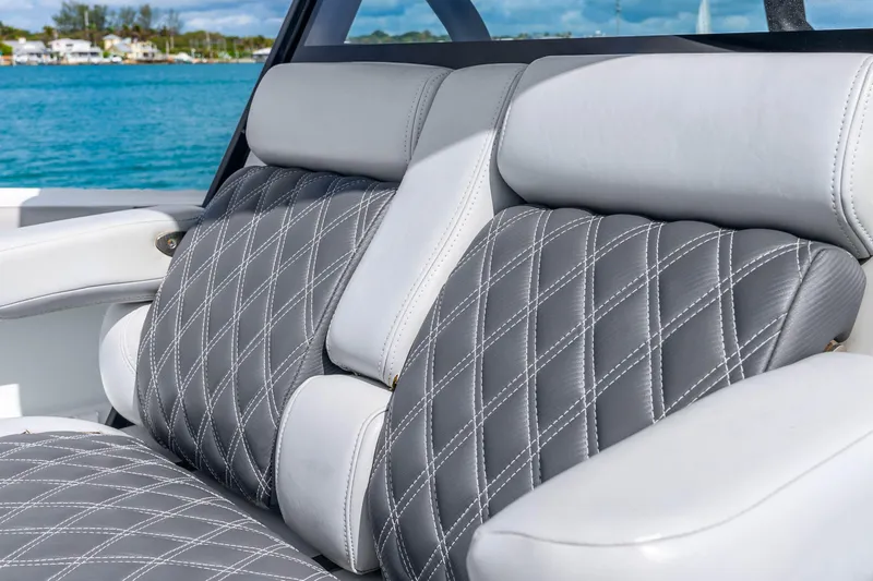 Slide: The Image of Luxurious seating on 2019 Yellowfin 42 Offshore boat with diamond-stitched upholstery. - 34
