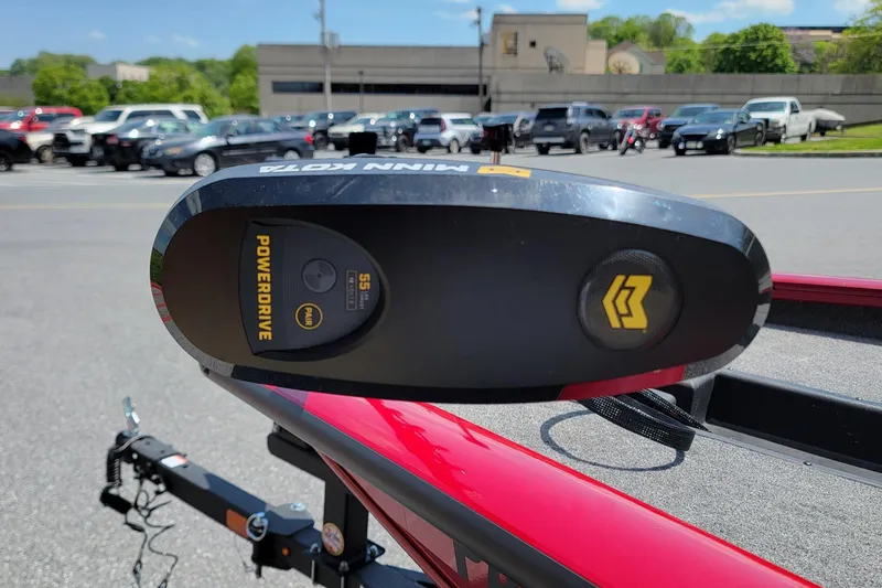 Slide: The Image of Minn Kota PowerDrive motor on 2025 Tracker Pro Team 175 boat, parked outdoors. - 6