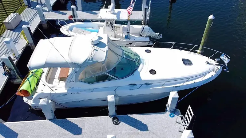 Slide: The Image of 2006 Sea Ray 340 Sundancer yacht docked at marina, aerial view. - 12