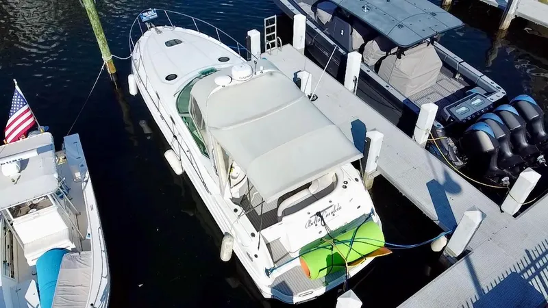 Slide: The Image of 2006 Sea Ray 340 Sundancer docked at marina, aerial view. - 13