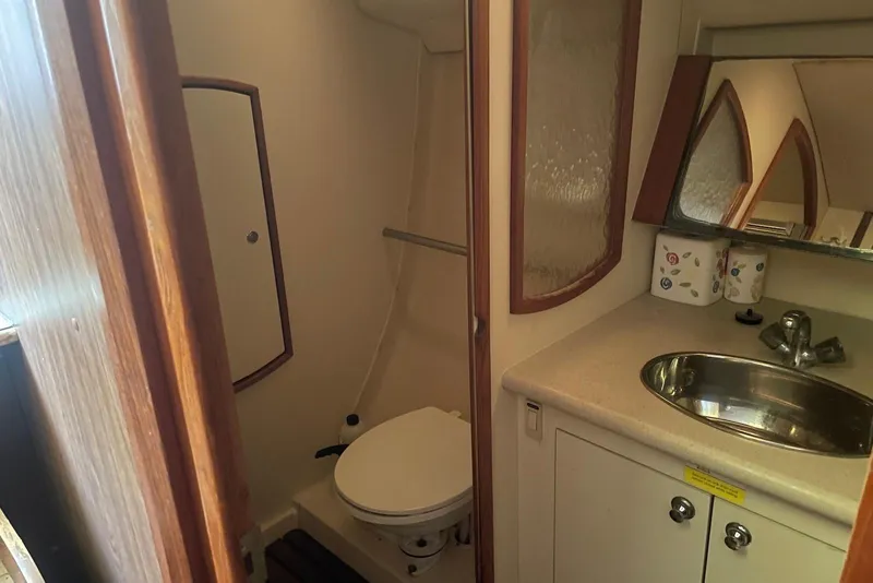 Slide: The Image of Bathroom interior of 2006 Hunter 36 yacht with sink and toilet. - 12