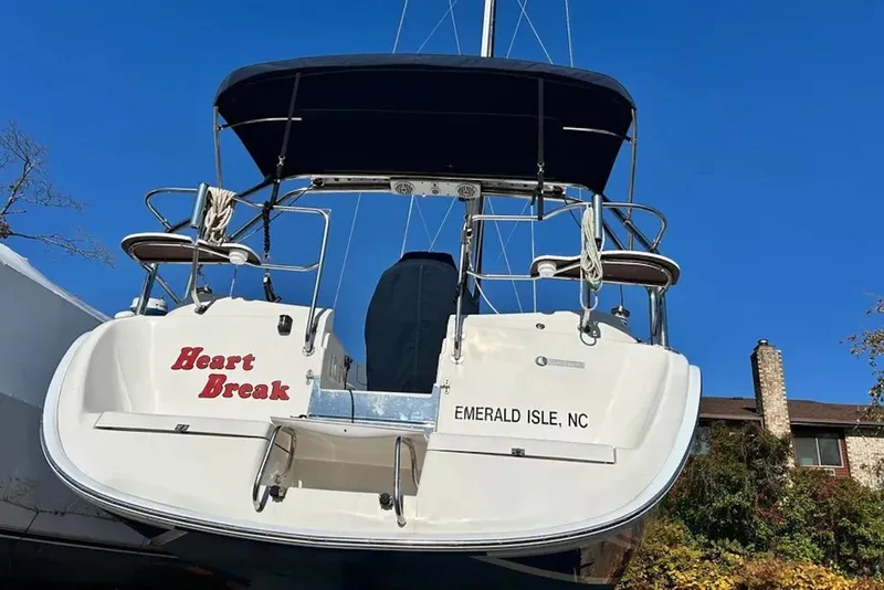 Slide: The Image of 2006 Hunter 36 sailboat named "Heart Break" docked at Emerald Isle, NC. - 2