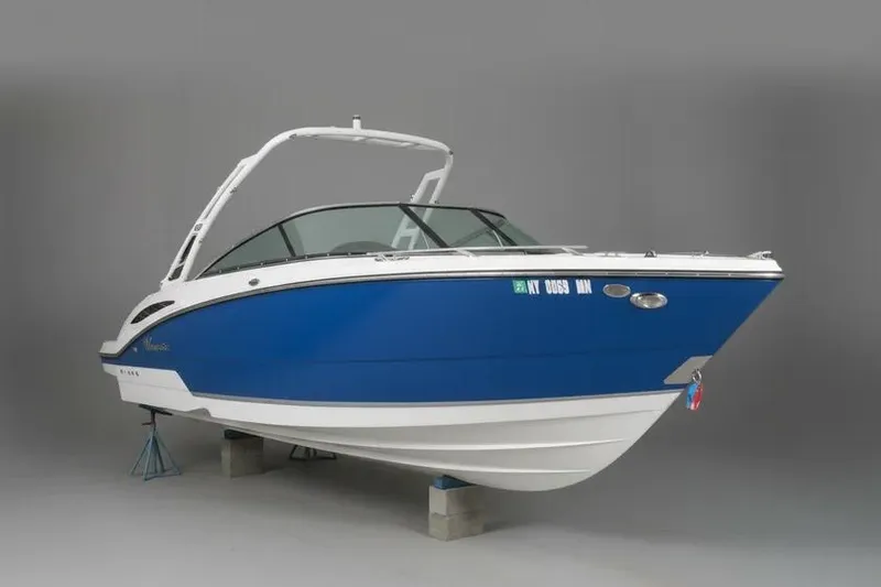 The Image of 2018 Monterey 278SS Super Sport boat in blue and white on display indoors. - 0