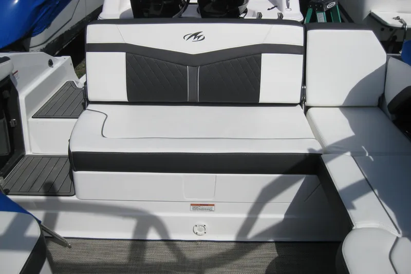 Slide: The Image of 2018 Monterey 278SS Super Sport boat seating, featuring sleek white and black upholstery. - 10