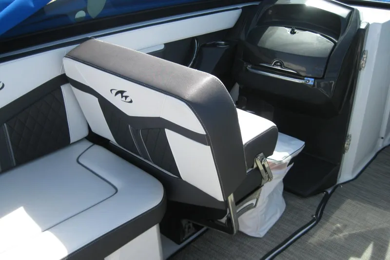 Slide: The Image of Interior of 2018 Monterey 278SS Super Sport boat with stylish seating and dashboard. - 13