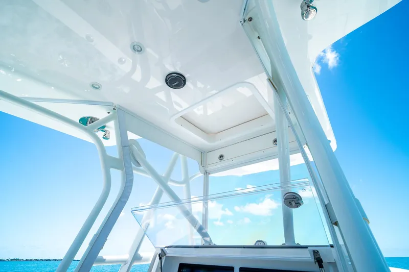 Slide: The Image of View of the SeaVee 322Z boat's structure against a clear blue sky, 2025 model. - 24