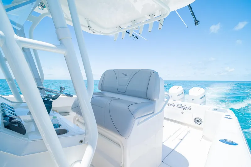 Slide: The Image of 2025 SeaVee 322Z boat interior with ocean view, featuring modern seating and controls. - 27