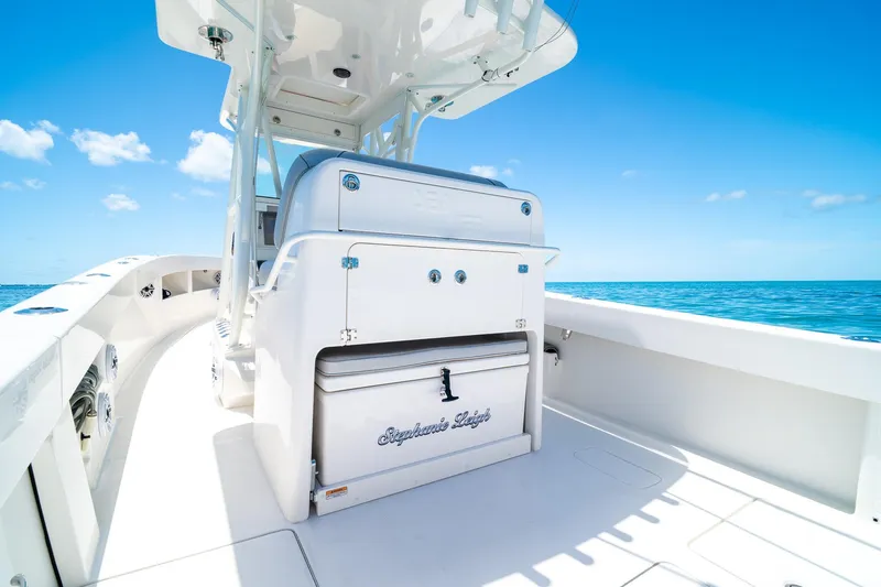 Slide: The Image of 2025 SeaVee 322Z boat interior with ocean view, featuring sleek white design. - 31