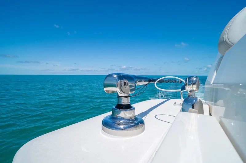 Slide: The Image of 2025 SeaVee 322Z boat cruising on clear blue ocean waters. - 37