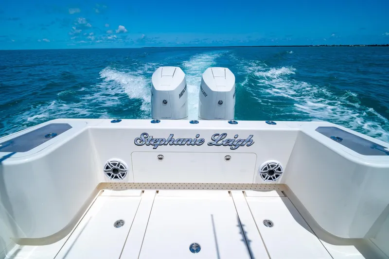 Slide: The Image of 2025 SeaVee 322Z boat named "Stephanie Leigh" cruising on open water. - 8