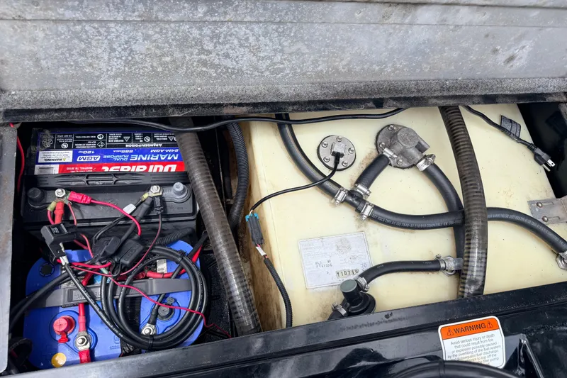 Slide: The Image of 2017 Tracker Pro Team 175 TXW boat battery and fuel system components. - 8
