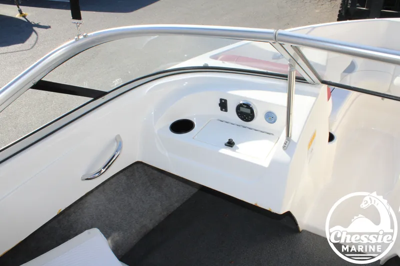 Slide: The Image of Interior of a 2015 Bayliner 170 boat with control console. - 11