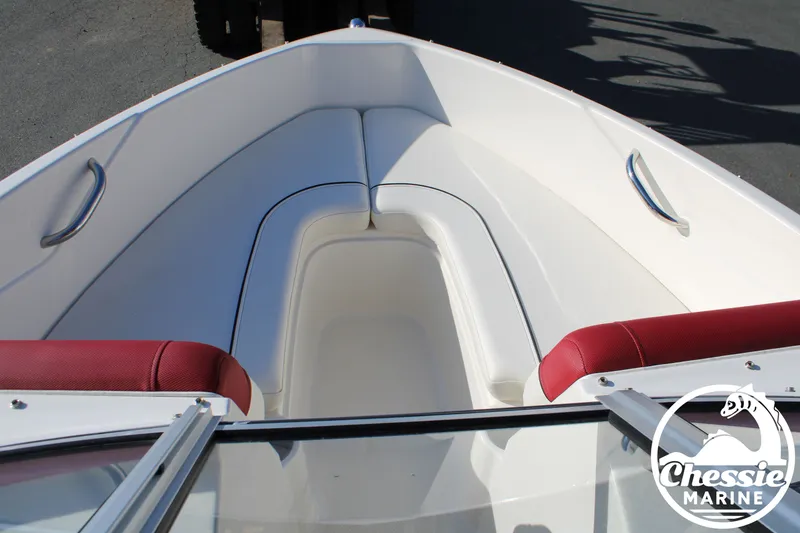 Slide: The Image of Interior of a 2015 Bayliner 170 boat with red seating. - 14