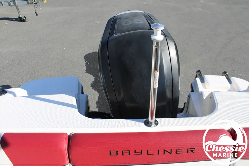 Slide: The Image of Rear view of a 2015 Bayliner 170 boat with engine. - 19