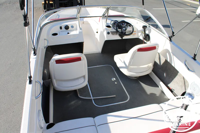 Slide: The Image of Interior of a 2015 Bayliner 170 boat with two seats. - 23
